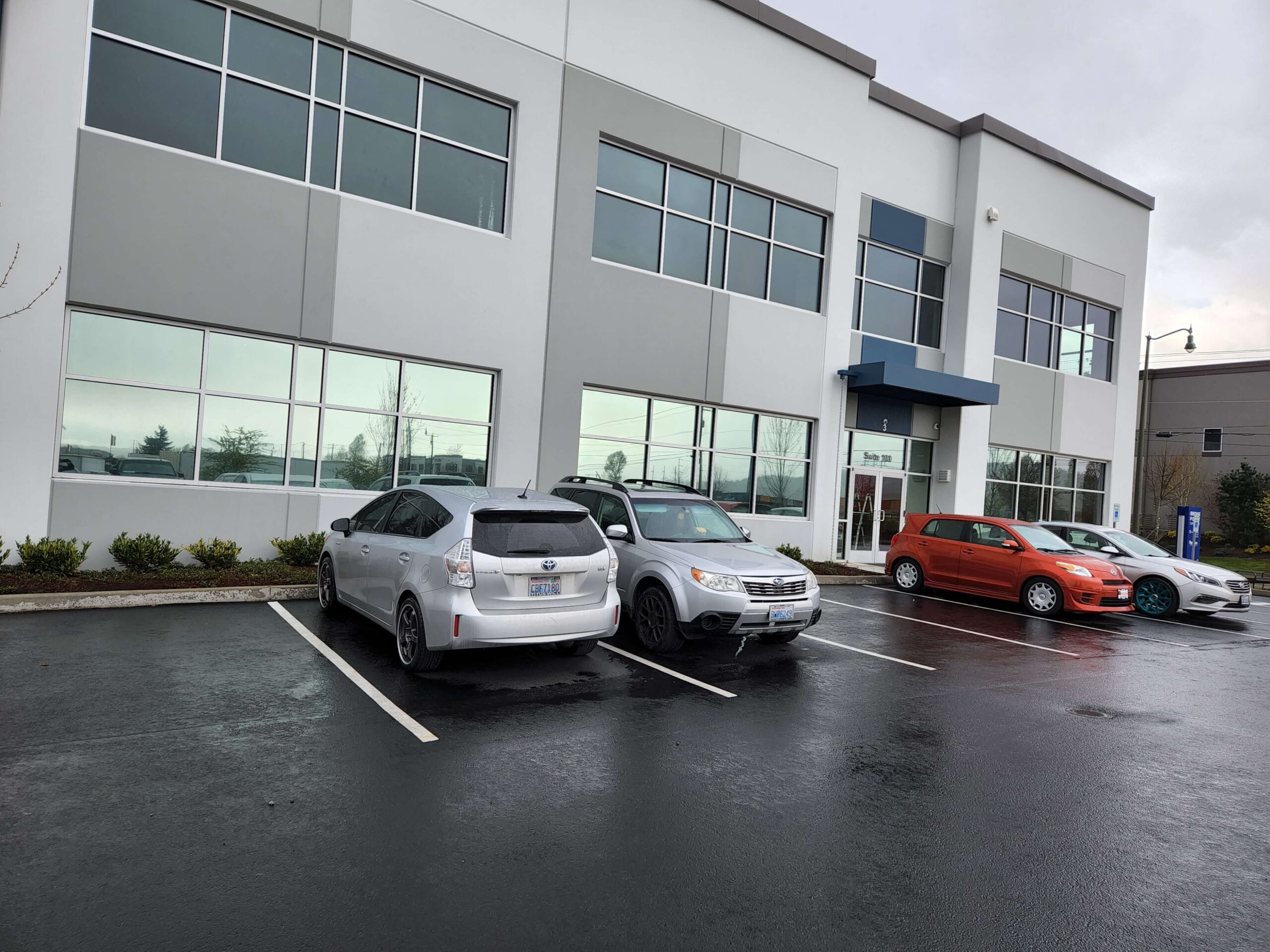 20220413_154051 Business window tinting completed on commercial property exterior.