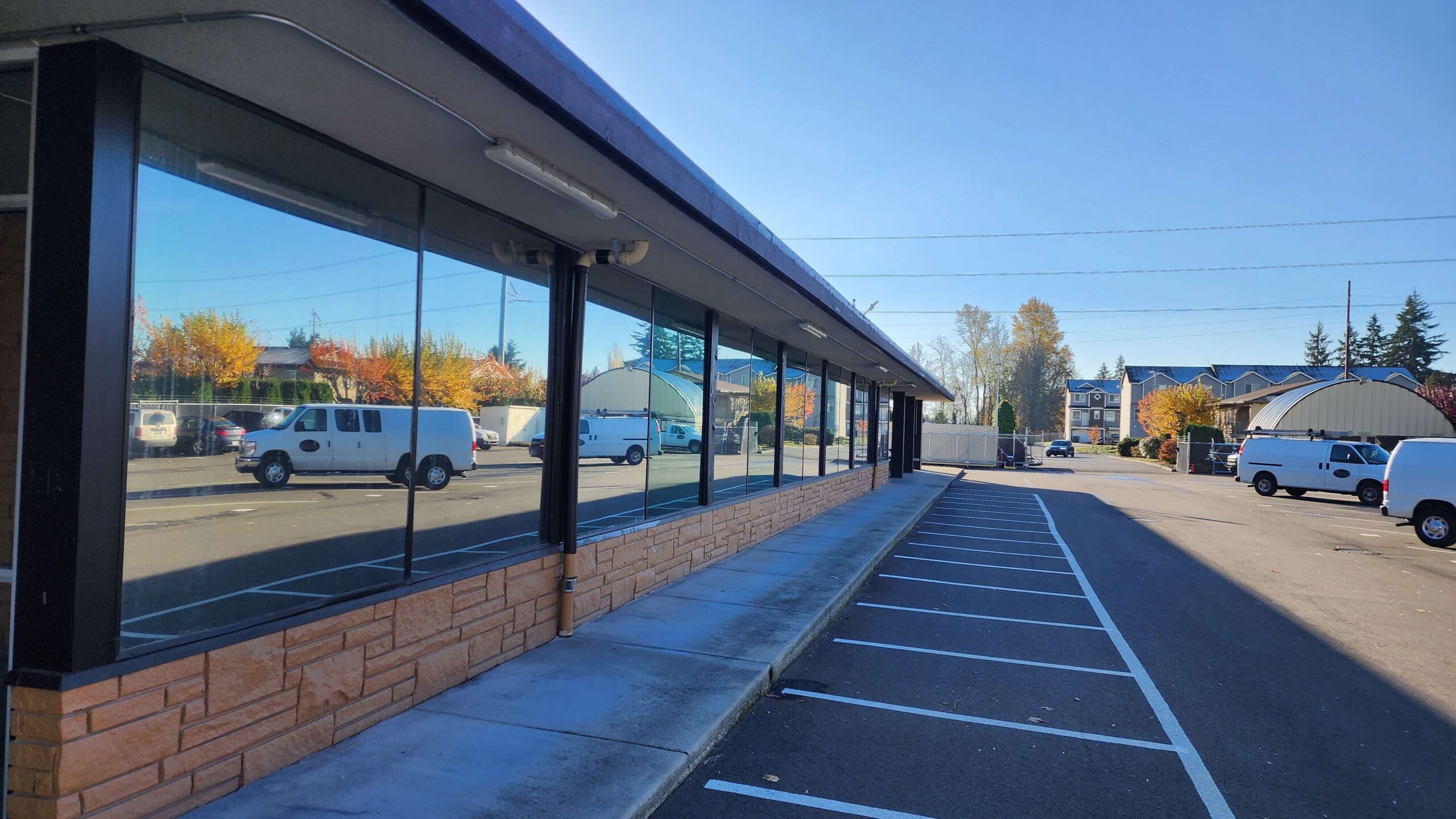 Window tint work in progress at SC Window Tinting installation bay.